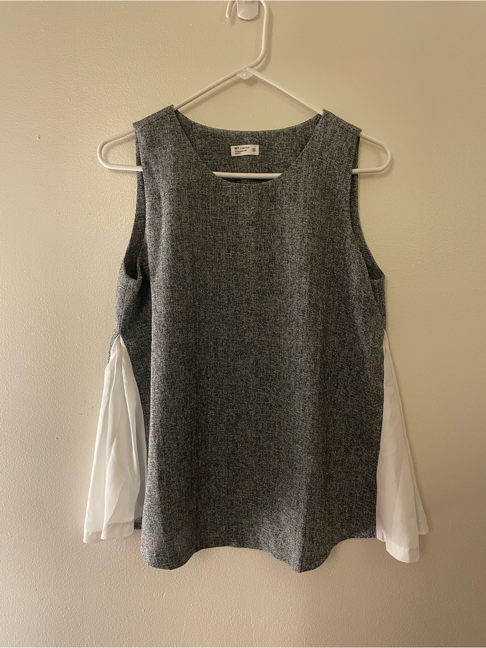 Sleeveless Gray Knit Top with White Sleeve Detail